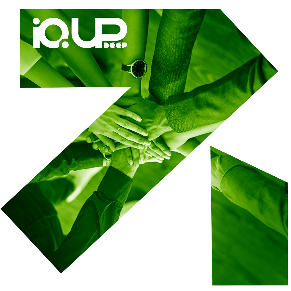Many hands stacked together, framed in the shape of an upward arrow