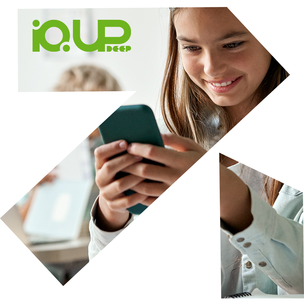Girl smiling at her phone while learning online